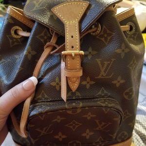 Preloved Louis Vuitton mini backpack.